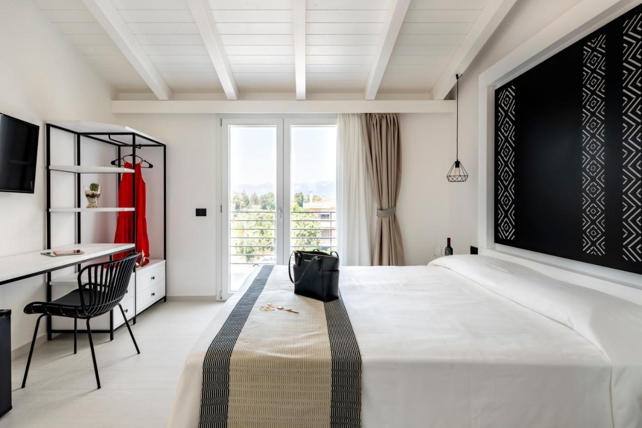 Cara A Bentu - Charming Rooms Tortolì Extérieur photo