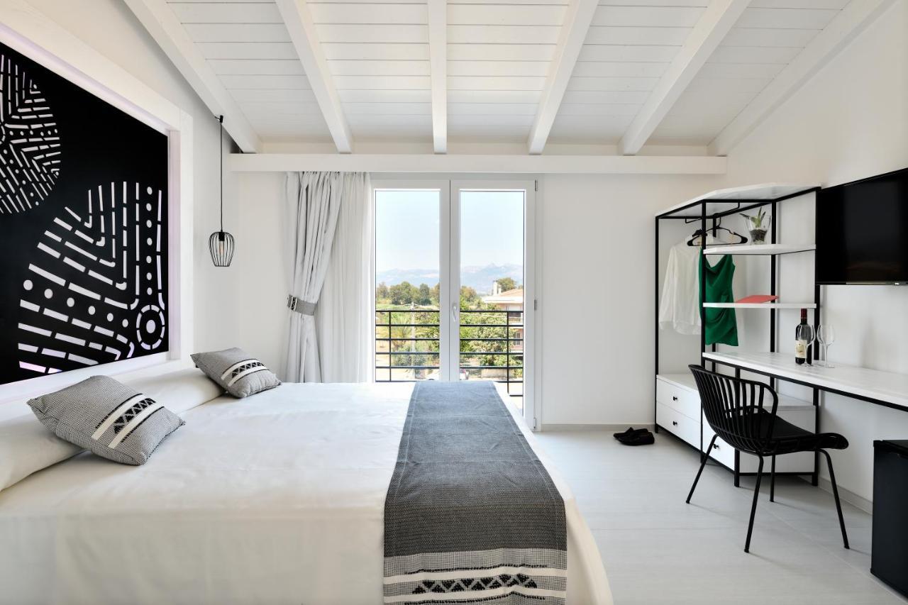Cara A Bentu - Charming Rooms Tortolì Extérieur photo